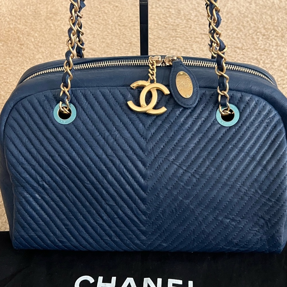 Excellent Like New condition Chanel Denim Blue Chevron distressed bowler tote
